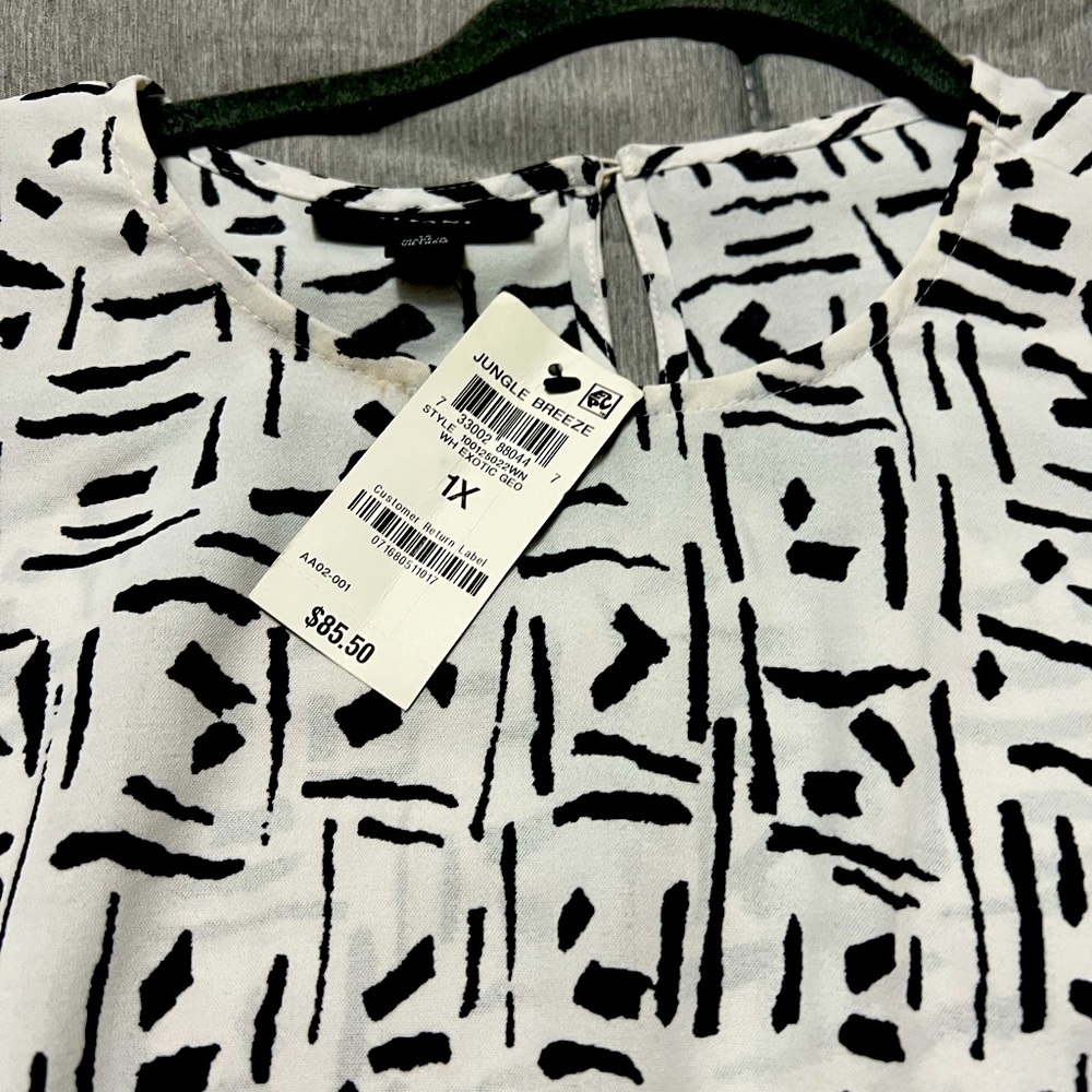 Plus white and black blouse.